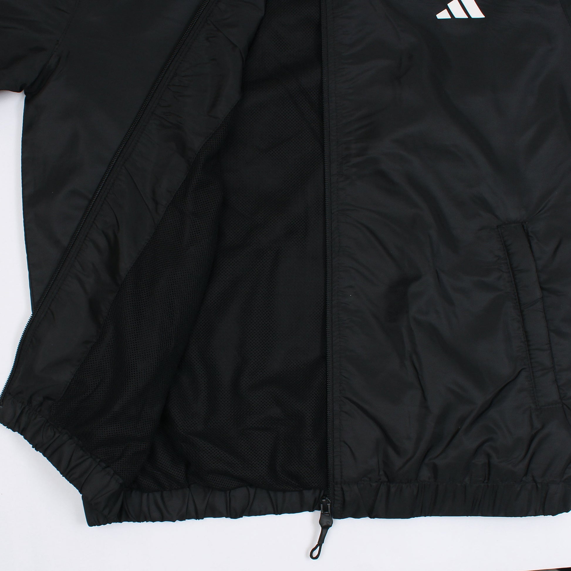 Black jacket with Adidas logo on a white background
